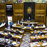 House of Representatives in session, confronting arguments for and against a bill.