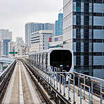 Autonomous monorail travels through the ultramodern Odaiba district in Tokyo Bay, Japan.