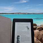 Portable e-book brought at the beach, 